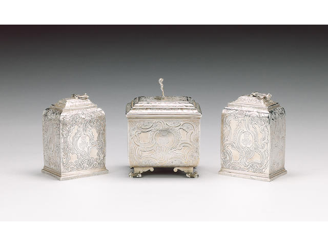 Two similar George II silver tea caddies and a sugar box by Eliza Godfrey, London 1742/3,