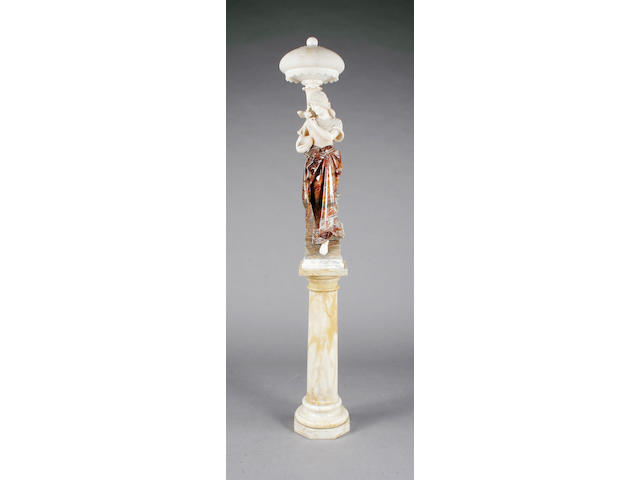 A 19th century French alabaster and marble figural lamp