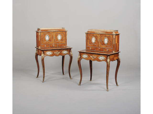 A pair of French late 19th/early 20th century kingwood and gilt metal mounted bonheur du jours