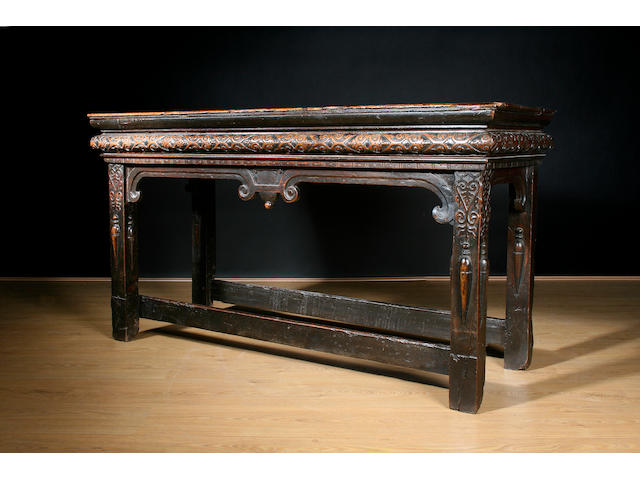 A rare early 17th Century walnut side table