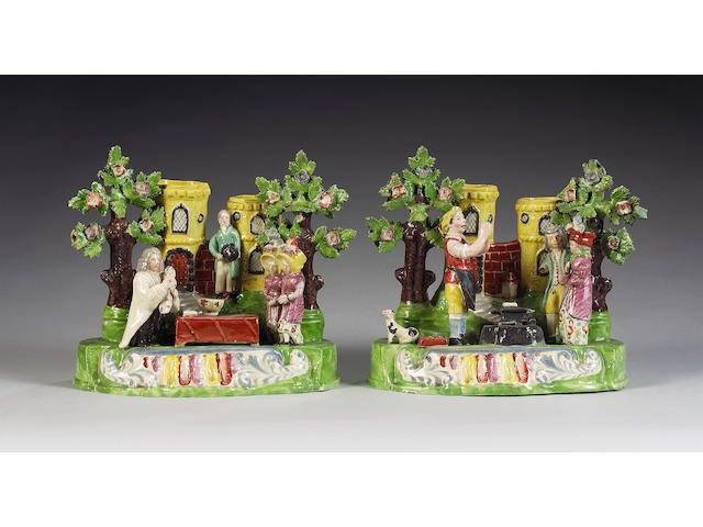 A pair of pearlware groups of 'The Baptism of Mary' and the 'Gretna Green Marriage', circa 1830,