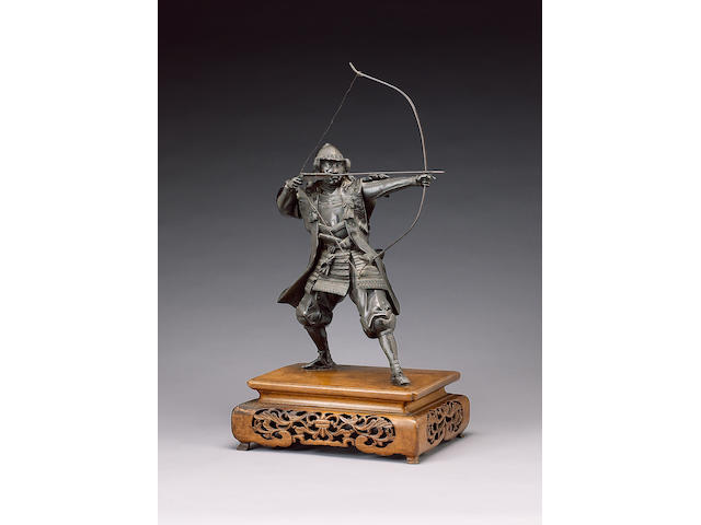 A bronze okimono of a standing Samurai,