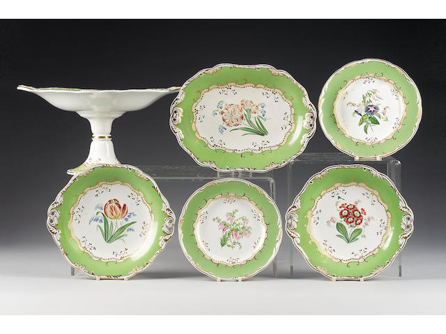 A Wedgwood earthenware botanical green ground dessert service, mid 19th century,