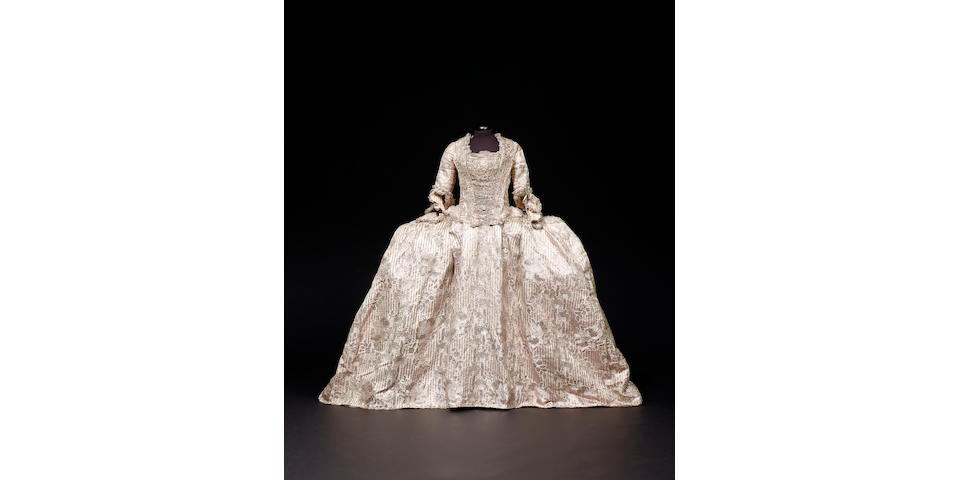 A rare and important Court Mantua and petticoat of ivory silk, French circa 1770