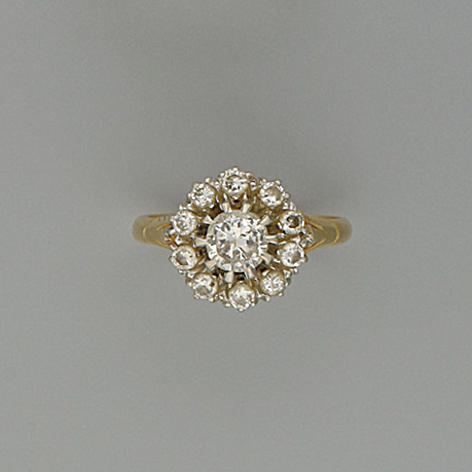 A diamond cluster ring,
