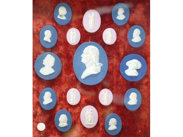 A framed set of seventeen Wedgwood style portrait medallions