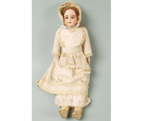 A German bisque head and shoulder doll,