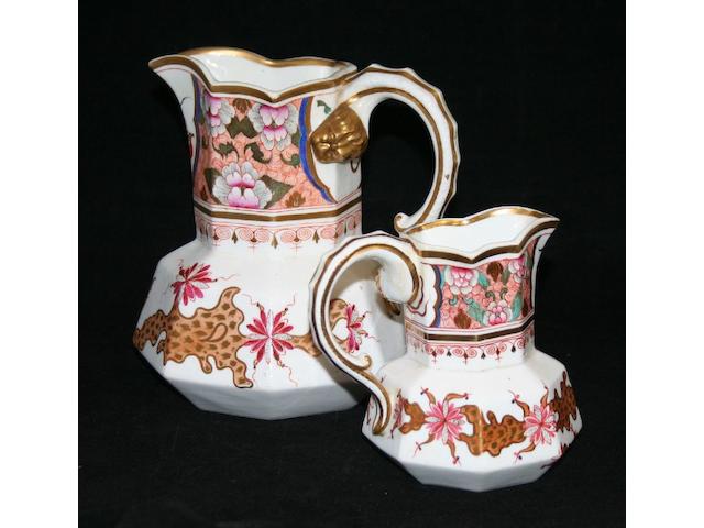 Two graduated English porcelain water jugs, circa 1840