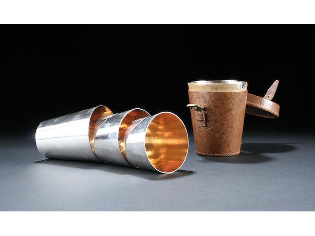 A set of six graduated beakers by Asprey and Company London 1919,