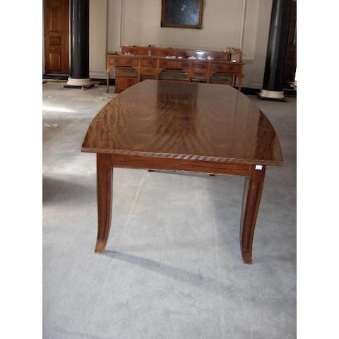 A mahogany quarter veneered board room table