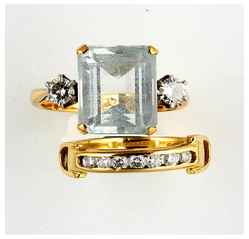 An aquamarine and diamond ring, (2)