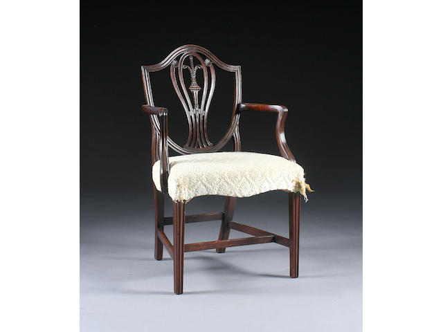 A George III Hepplewhite-style mahogany elbow chair