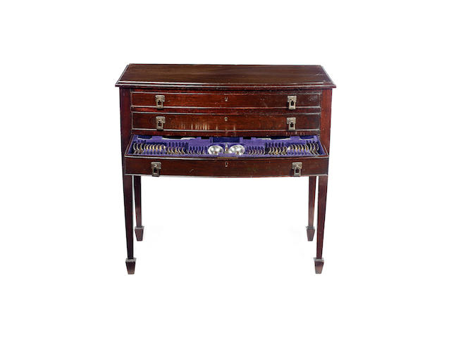 An extensive silver Art Deco table service of flatware, contained in a mahoganny three draw table cabinet, by E. Viner, Sheffield 1936,