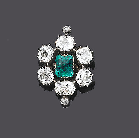 A 19th century emerald and diamond pendant/brooch