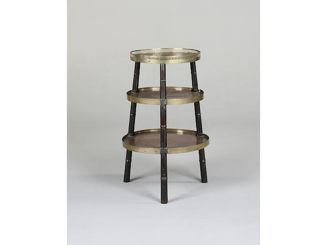 A late Regency mahogany and brass three tier circular whatnot