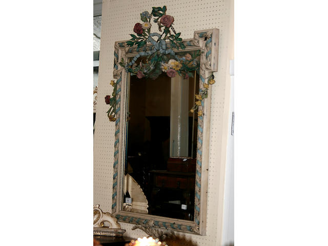 A bevelled wall mirror,