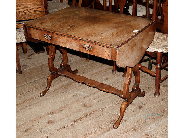 A reproduction walnut veneered sofa table,