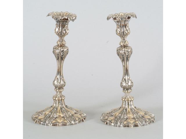 A pair of late Victorian candlesticks unmarked,