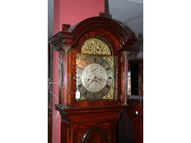 A late 18th Century oak painted dial longcase clock