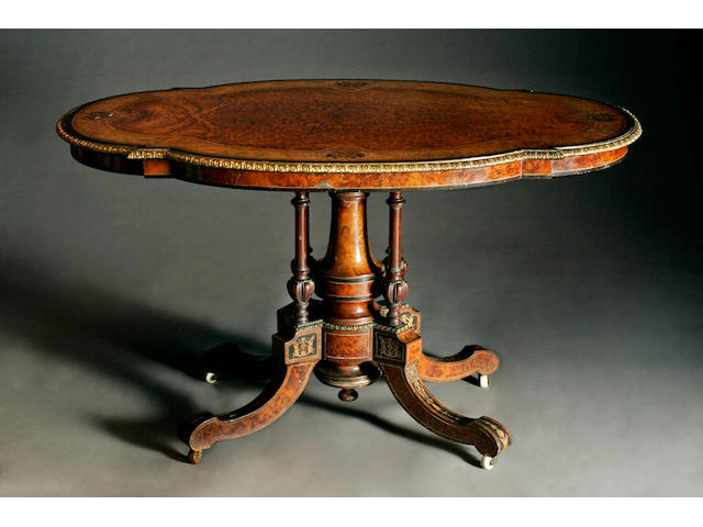 A mid Victorian amboyna, thuya and ebonised centre table