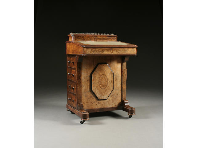 A mid Victorian inlaid figured walnut davenport