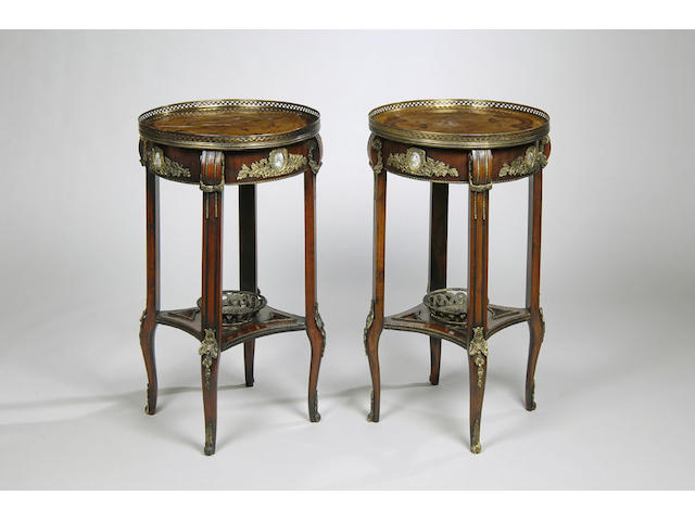 A pair of French transitional style walnut and inlaid gilt metal mounted table ambulantes