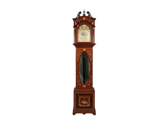A good early 20th century inlaid mahogany-cased chiming long-case clock sold with three original brass weights, gongs, pendulum and key