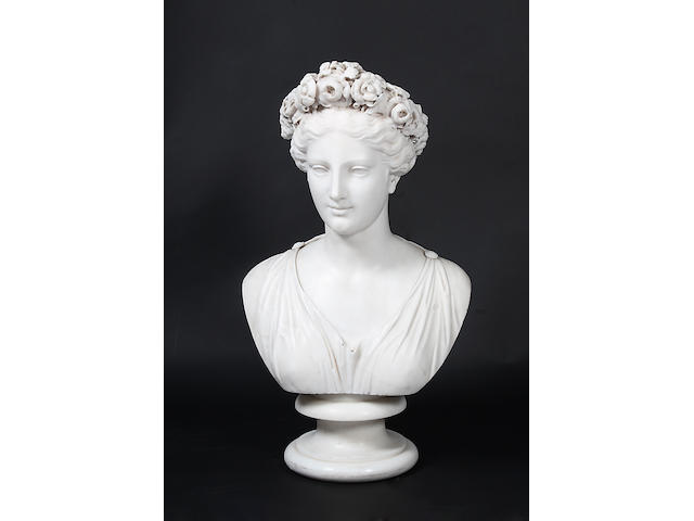 A 19th century marble bust of a young woman