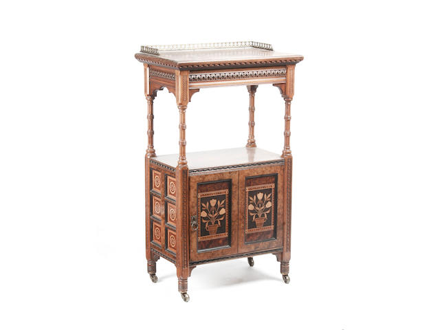 A late 19th century Gillows Gothic Revival walnut music cabinet,