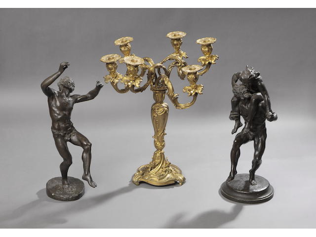 A bronze figure after the antique "Dancing Faun" And a companion bronze, 47cm high. (2)