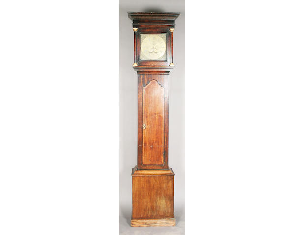 A mid/late 18th century and later oak longcase clock