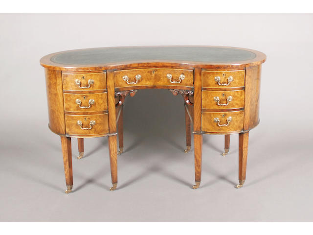 A 19th century style burr walnut, walnut and line edged kidney shaped kneehole desk,