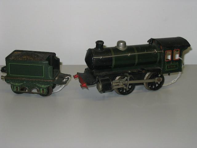 An 'O' gauge tinplate locomotive and tender,