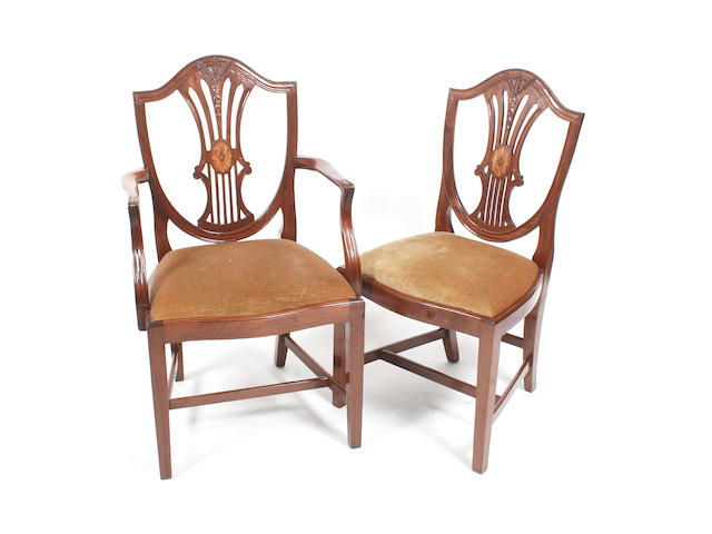 A set of eight George III style mahogany dining chairs