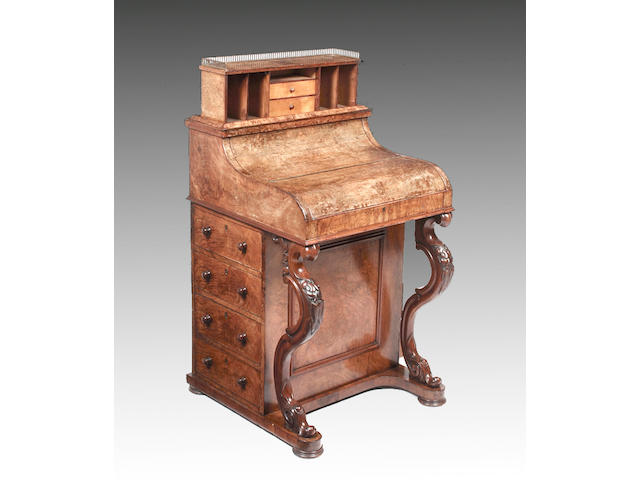 A mid Victorian walnut piano front pop up davenport