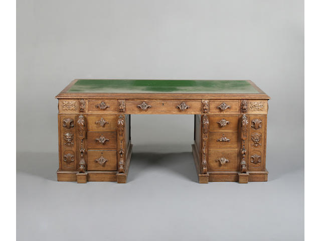 An unusual late Victorian oak partner's desk