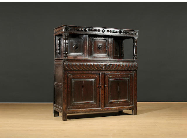 A mid-17th Century oak court cupboard of small proportions