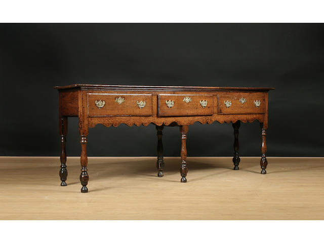 A mid 18th Century oak dresser base