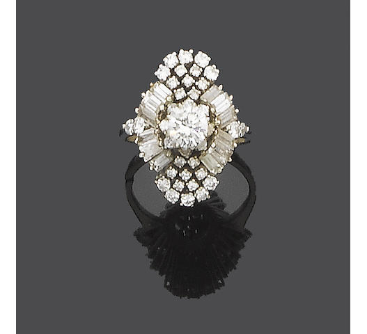 A diamond and laser drilled diamond cluster ring