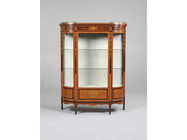 An Edwardian satinwood, sycamore and marquetry display cabinet