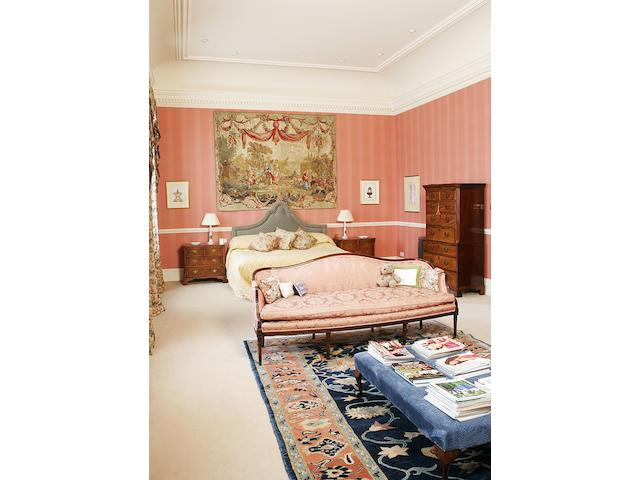 A George III style mahogany framed sofa
