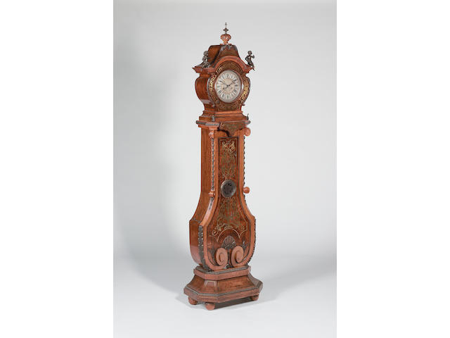 A late 19th century brass inlaid walnut longcase clock The movement signed Gustav Becker