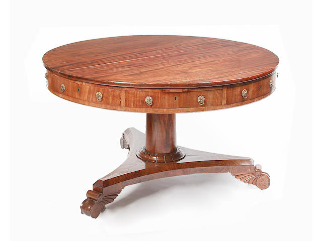 A William IV or early Victorian mahogany drum table,