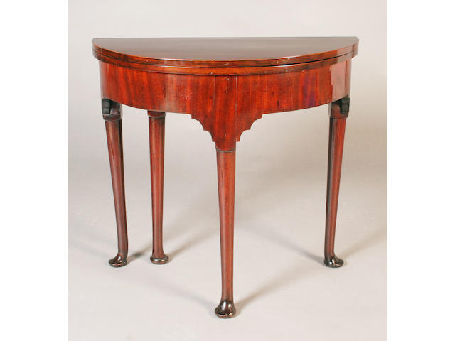 A George III mahogany demi-lune tea table,