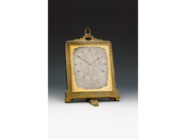 A mid 19th century engraved brass carriage clock  in travelling case Retailed by London and Ryder, attributed to Thomas Cole.