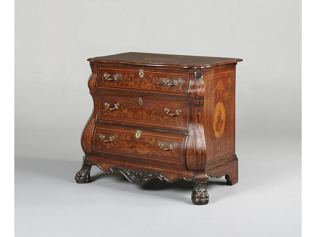 An 18th century style mahogany, walnut and marquetry chest of drawers