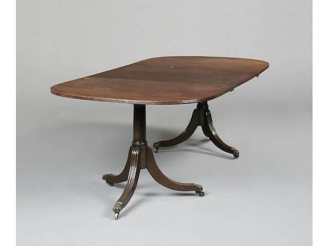 A 19th century twin pedestal  mahogany dining table