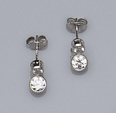 A pair of diamond drop earstuds