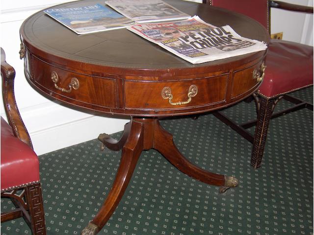 A George III style drum table,