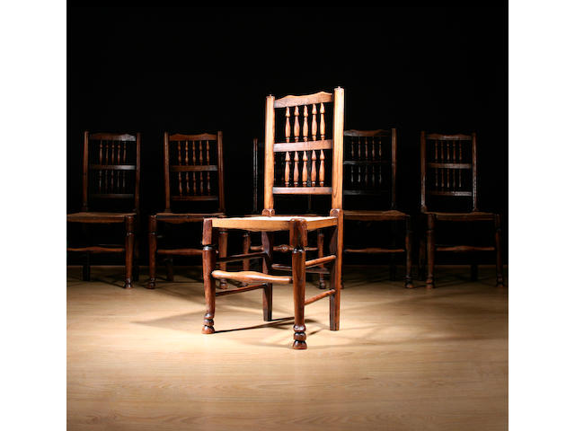A harlequin set of six 19th Century ash spindleback dining chairs